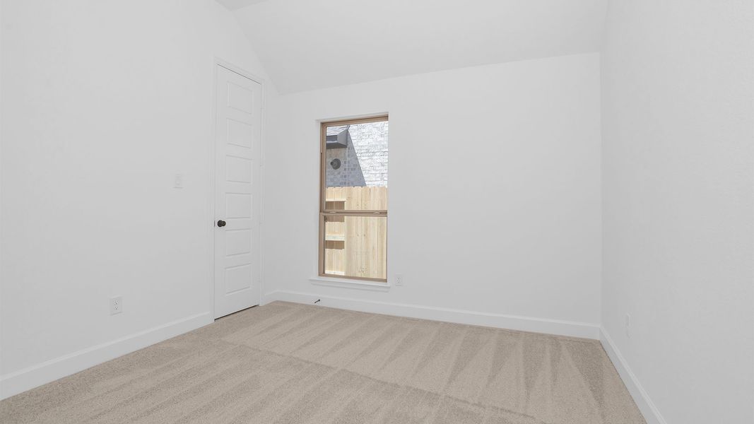 Spacious, unfurnished interior of a new home in Lakes of Cane Island, Katy (Image 59).