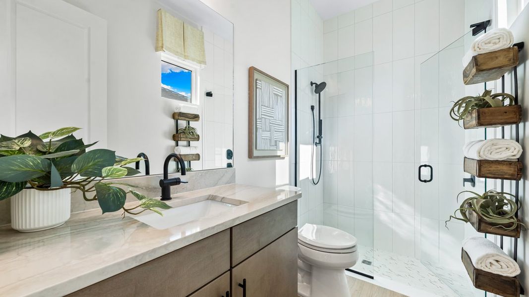 Furnished interior view inside a new home in Esplanade by the Islands, Naples (Image 9).