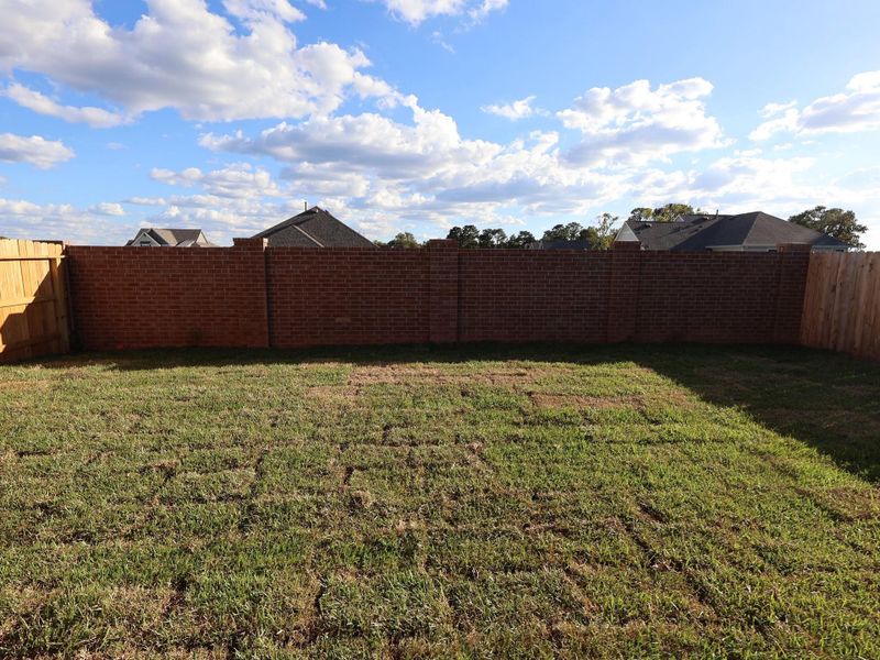 Exterior details and patio area of a home in Lone Star Landing, Montgomery (Image 3). Exterior details and patio area of a home in Lone Star Landing, Montgomery (Image 3).