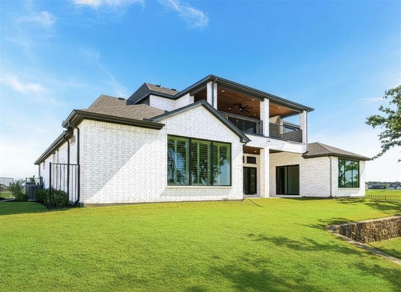 Exterior details and patio area of a home in The Resort on Eagle Mt. Lake, Fort Worth (Image 23).