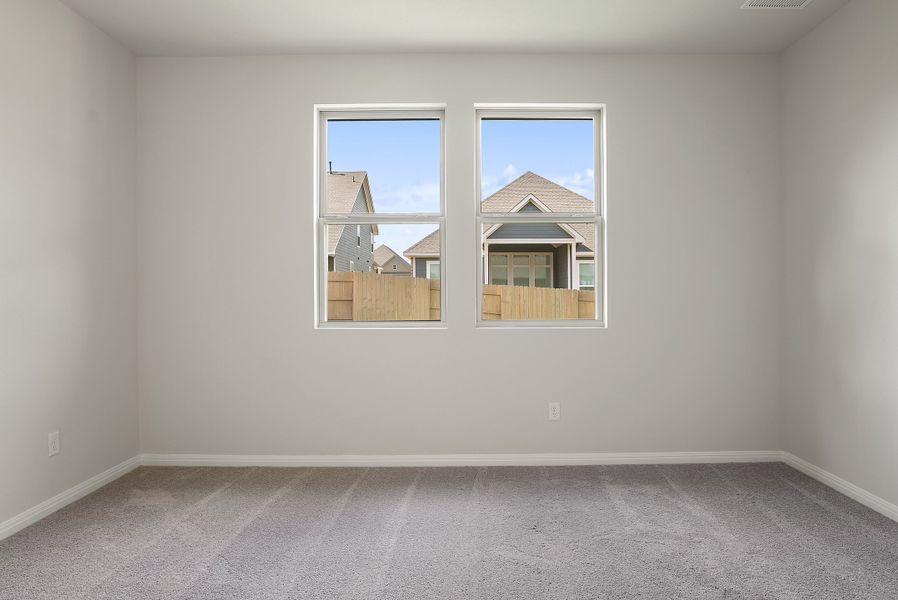 Representative unfurnished interior of a home built from the Texoma by Ashton Woods in The Colony 50s, Bastrop (Image 33).