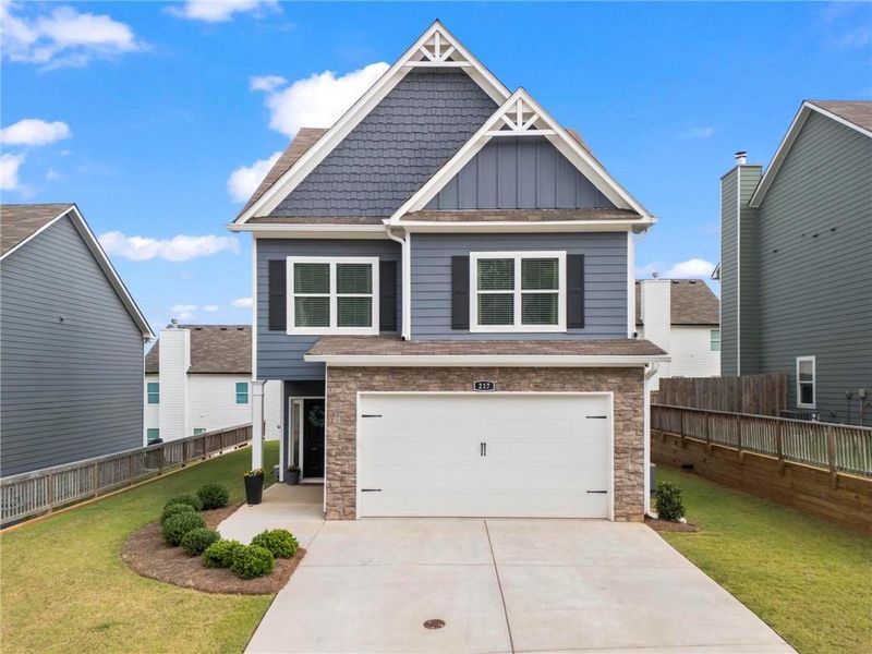 Front exterior of a new home in , Cartersville, GA, highlighting curb appeal (Image 2).