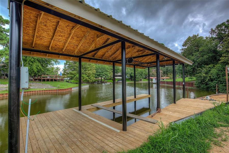 Dock area featuring a water view Dock area featuring a water view