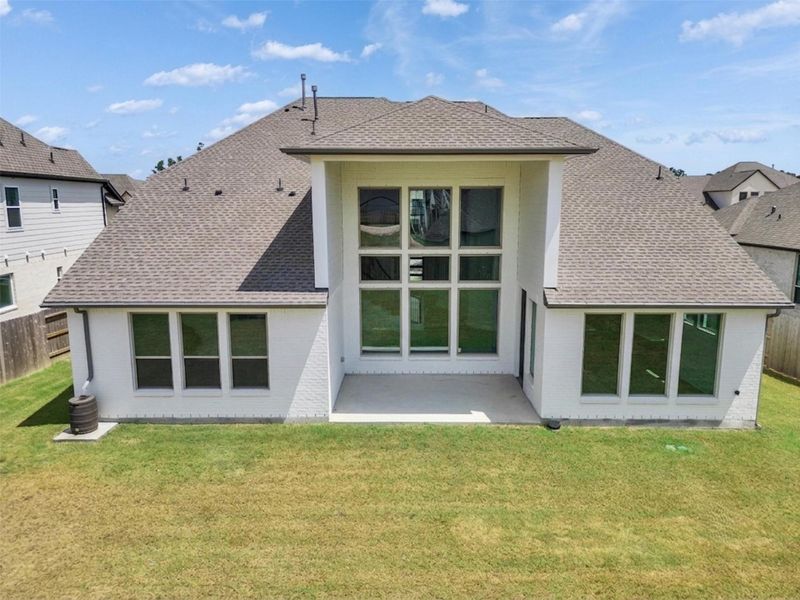 Exterior details and patio area of a home in ARTAVIA®, Conroe (Image 3). Exterior details and patio area of a home in ARTAVIA®, Conroe (Image 3).