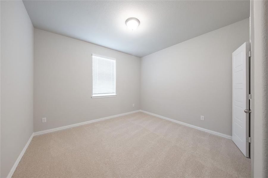 Spacious, unfurnished interior of a new home in Lake Pointe: Lake Pointe at Paloma Creek, Little Elm (Image 23).