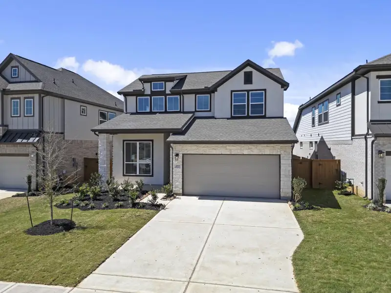 Front exterior of a new home in Nolina, Georgetown, TX, highlighting curb appeal (Image 1). Front exterior of a new home in Nolina, Georgetown, TX, highlighting curb appeal (Image 1).