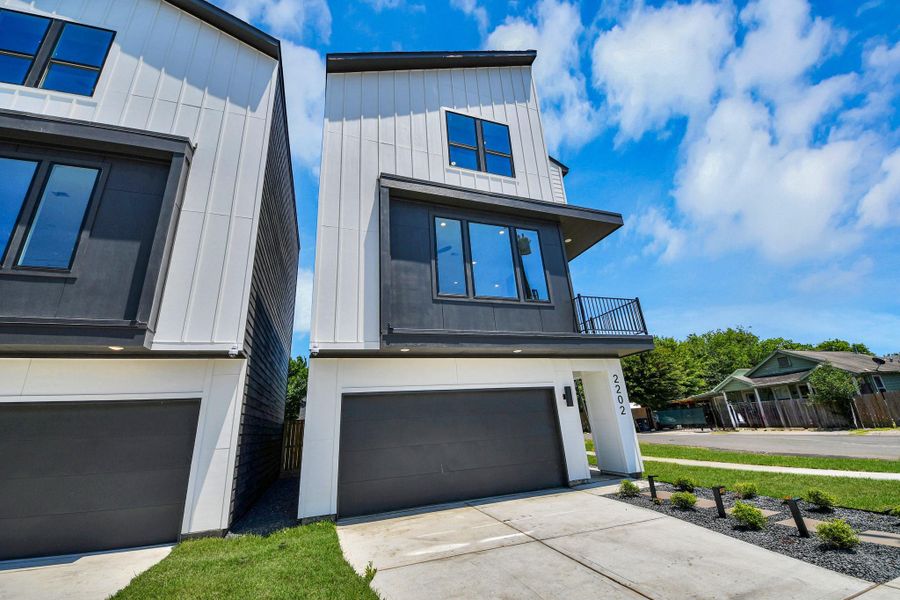 Striking modern exterior with bold contemporary architecture, clean lines, & exceptional curb appeal in a prime inner-loop location.