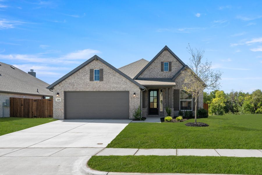 Front exterior of a new home in Hunters Ridge, Crowley, TX, highlighting curb appeal (Image 1). Front exterior of a new home in Hunters Ridge, Crowley, TX, highlighting curb appeal (Image 1).