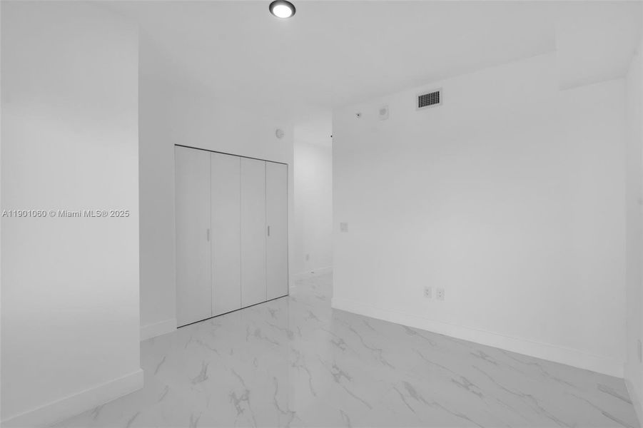 Spacious, unfurnished interior of a new home in Aria Reserve, Miami (Image 32). Spacious, unfurnished interior of a new home in Aria Reserve, Miami (Image 32).