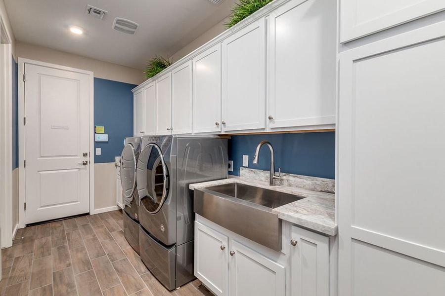 Representative furnished interior of a home built from the Diamond by Elliott Homes in Forté at Granite Vista, Waddell (Image 11). Representative furnished interior of a home built from the Diamond by Elliott Homes in Forté at Granite Vista, Waddell (Image 11).
