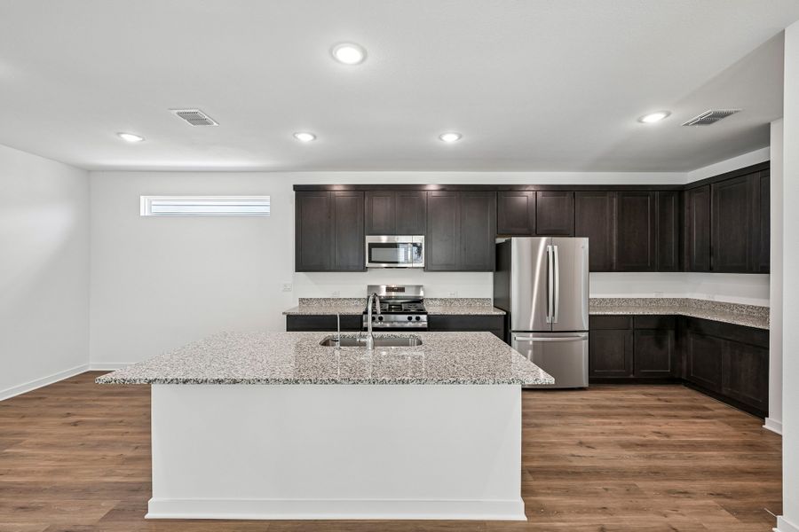 Representative furnished interior of a home built from the 3501 by Risewell Homes in Parkton Square, Kyle (Image 4).