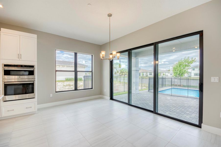 Furnished interior view inside a new home in Apex at Avenir, Palm Beach Gardens (Image 51).