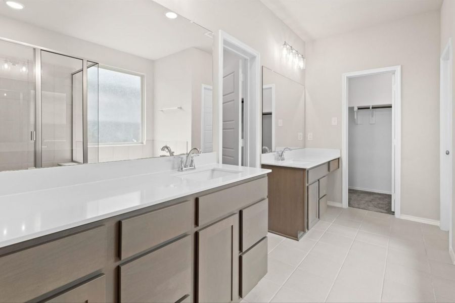 Representative furnished interior of a home built from the Basswood II Sunterra 50s by Brohn Homes in Sunterra, Katy (Image 11). Representative furnished interior of a home built from the Basswood II Sunterra 50s by Brohn Homes in Sunterra, Katy (Image 11).