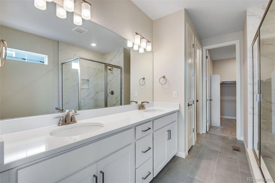 Furnished interior view inside a new home in Ensemble at The Aurora Highlands, Aurora (Image 13).