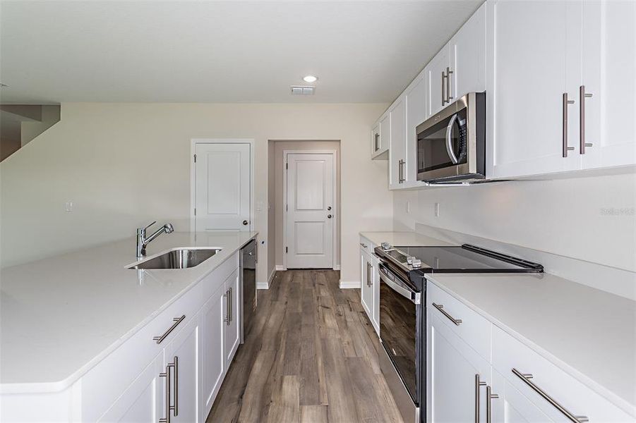 Furnished interior view inside a new home in Scenic Terrace, Haines City (Image 32).