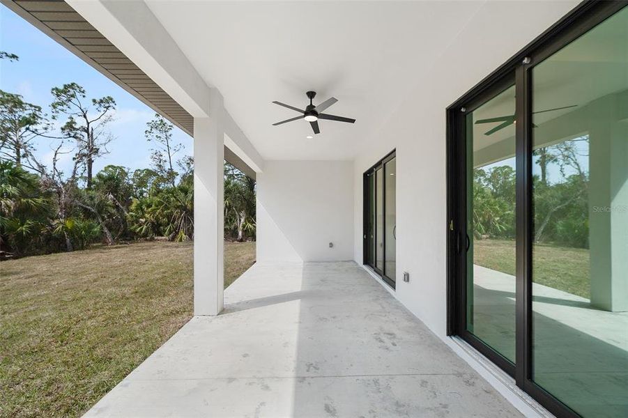 Exterior details and patio area of a home in , North Port (Image 23).