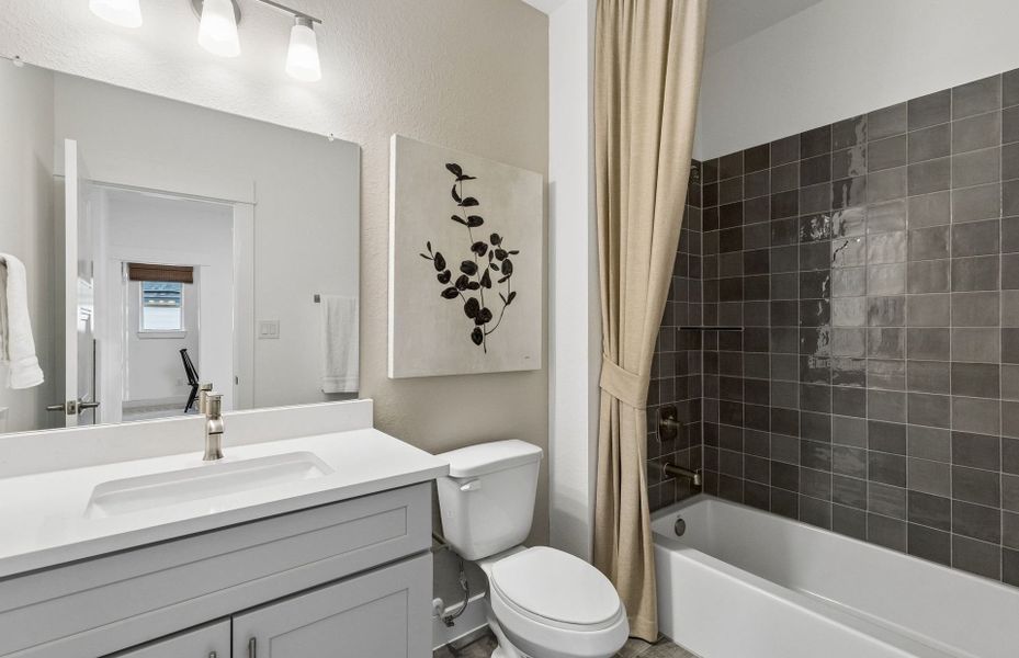 Representative furnished interior of a home built from the Iredell by Pulte Homes in Katy Court, Katy (Image 12).