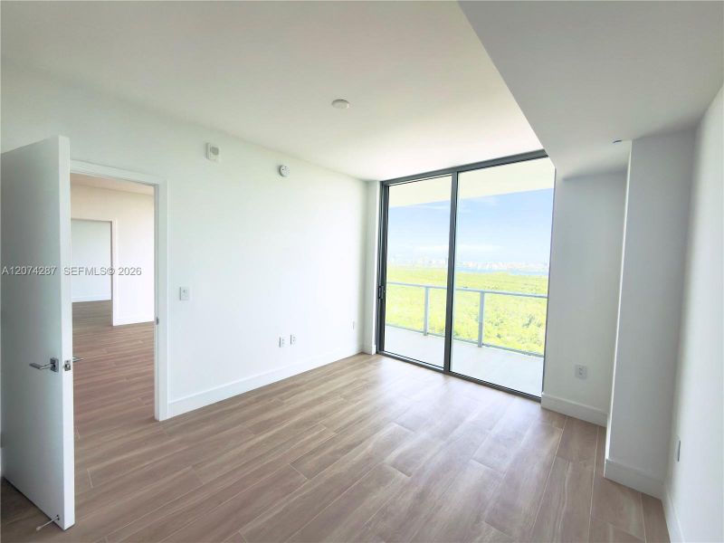 Spacious, unfurnished interior of a new home in , North Miami (Image 23).