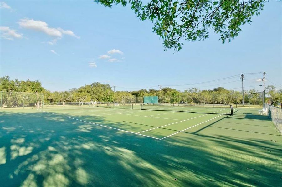 Tennis court along with access to the community basketball court