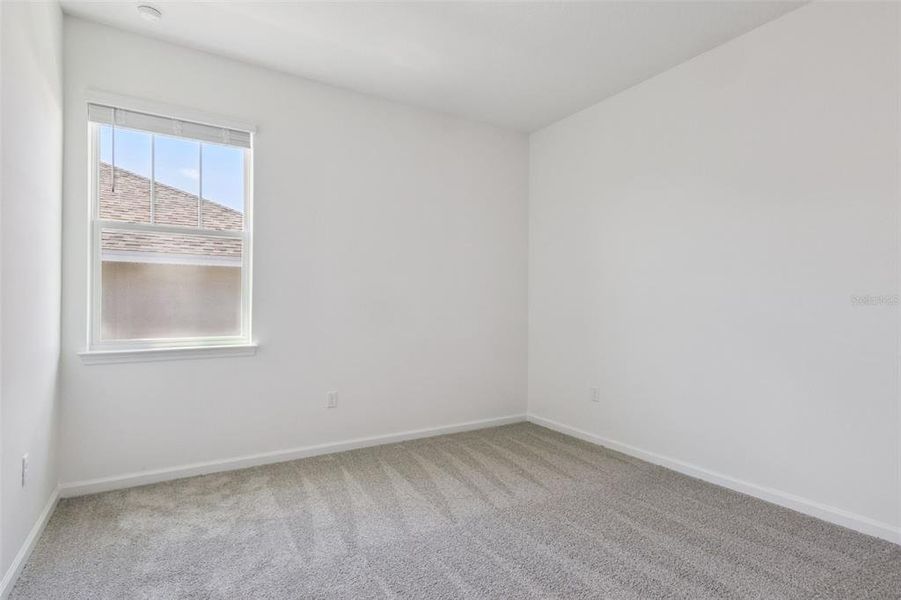 Spacious, unfurnished interior of a new home in Grand Isle, Grand Island (Image 14).