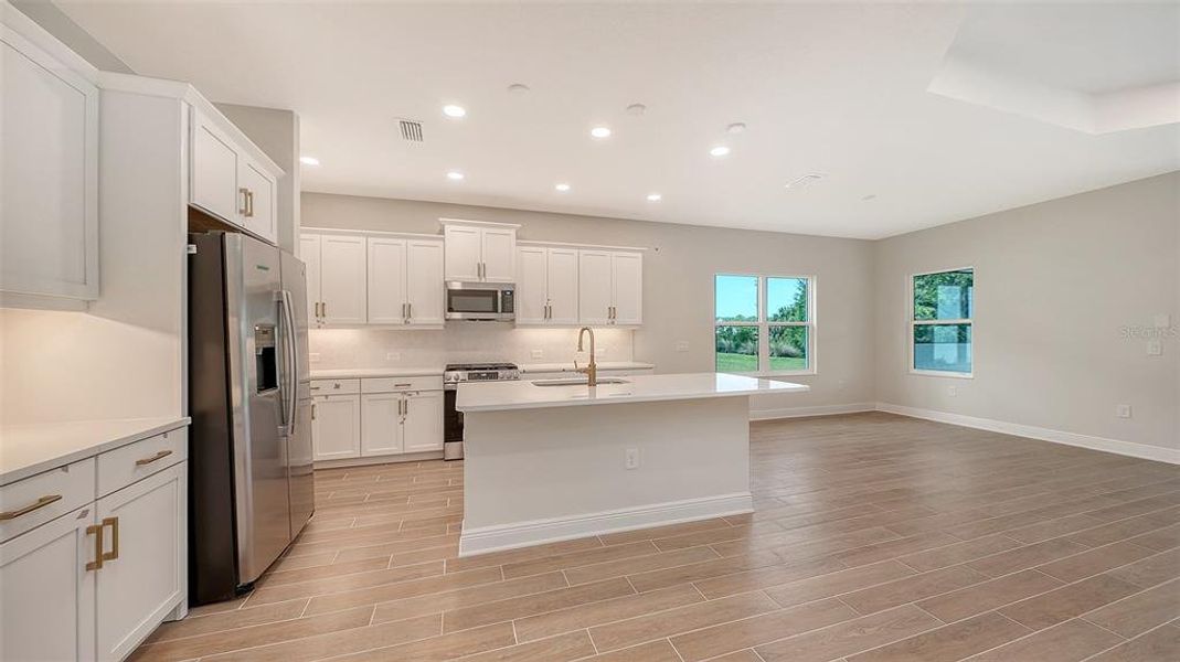 Furnished interior view inside a new home in Grand Park, Sarasota (Image 13).