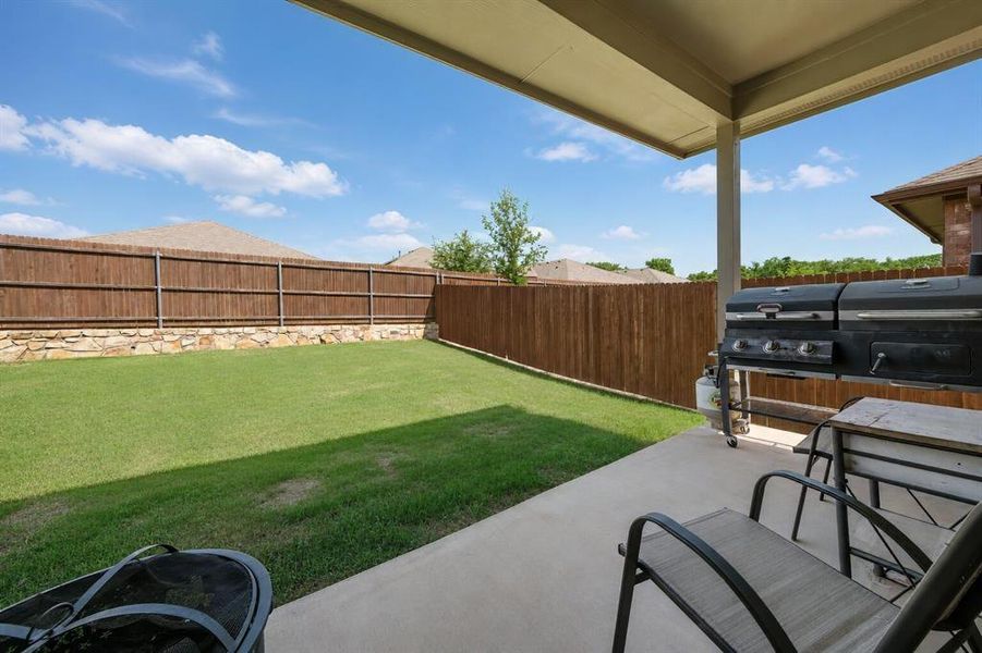 Exterior details and patio area of a home in Springhill South, Boyd (Image 21).