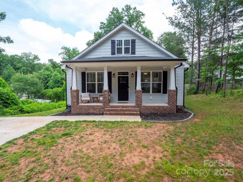 Front exterior of a new home in , Stanley, NC, highlighting curb appeal (Image 19).