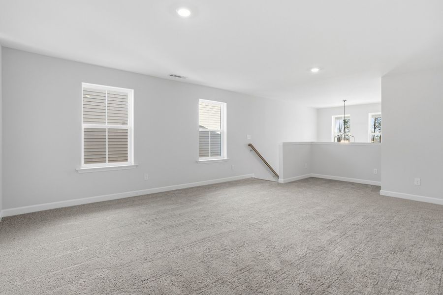 Spacious, unfurnished interior of a new home in Renaissance at White Oak, Garner (Image 26).