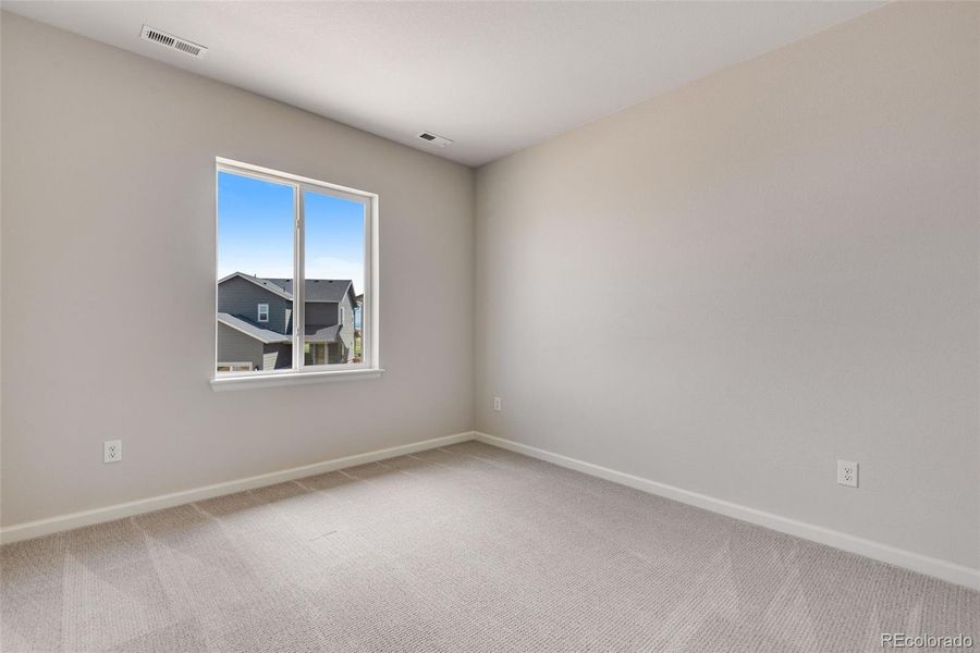 Spacious, unfurnished interior of a new home in Crescendo at The Aurora Highlands, Aurora (Image 18).