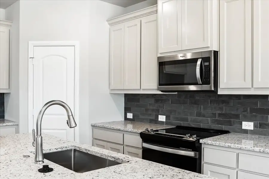 Representative furnished interior of a home built from the The Sapphire Ranch II by Doug Parr Custom Homes in Spring Valley Ranch, Paradise (Image 5).