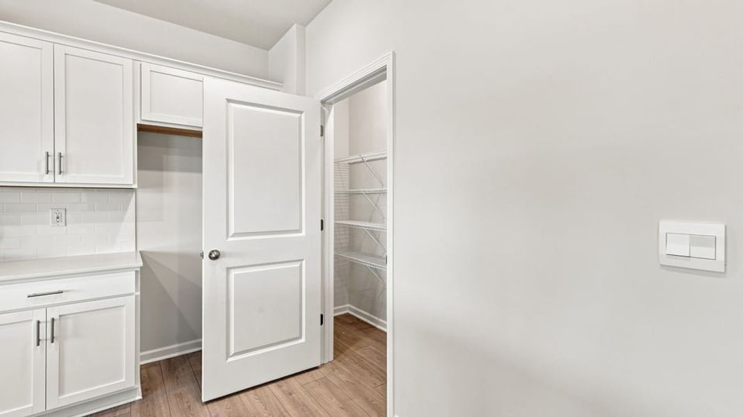 Furnished interior view inside a new home in Hunters Ridge, Woodruff (Image 12).