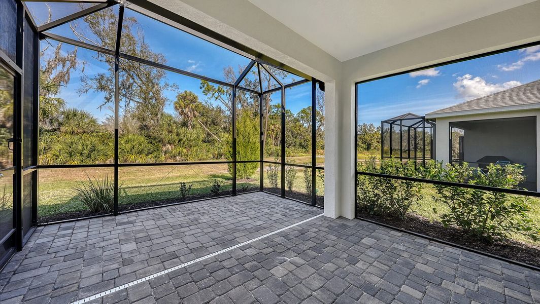 Exterior details and patio area of a home in Wildleaf, Parrish (Image 3).