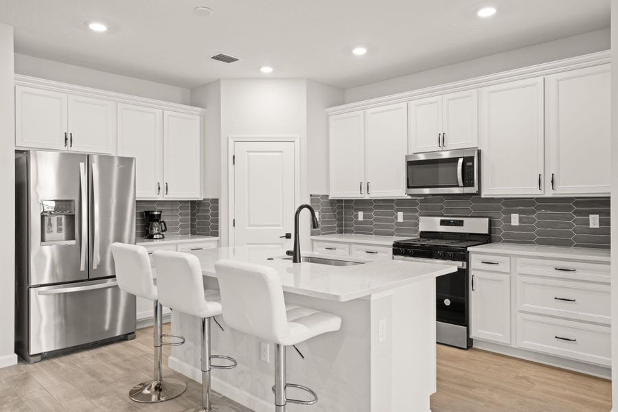 Furnished interior view inside a new home in Veranda Gardens, Port St. Lucie (Image 3).