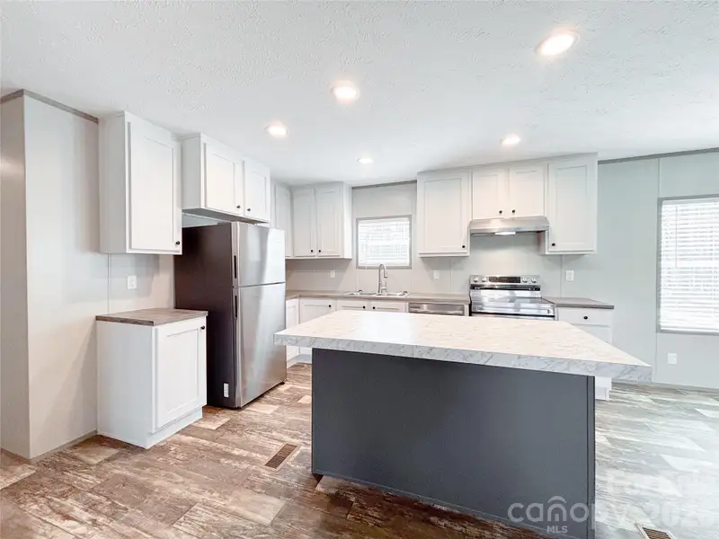 Furnished interior view inside a new home in , Connelly Springs (Image 4).