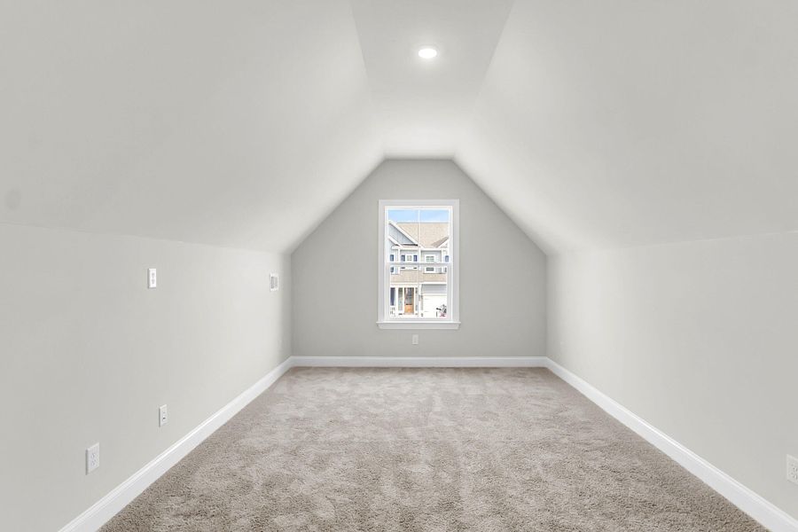 Spacious, unfurnished interior of a new home in Tidewater at Lakes of Cane Bay, Summerville (Image 29).