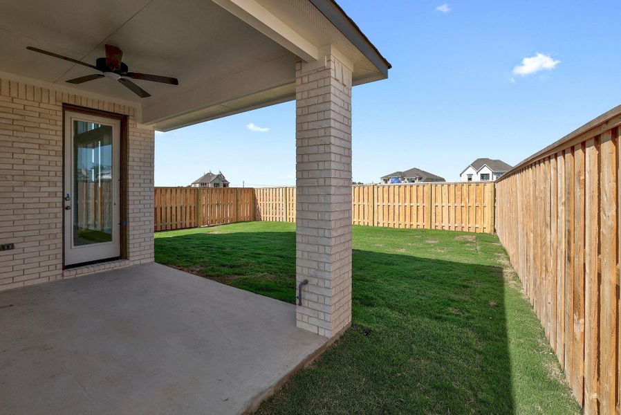 Exterior details and patio area of a home in Parmer Ranch - 40', Georgetown (Image 4). Exterior details and patio area of a home in Parmer Ranch - 40', Georgetown (Image 4).