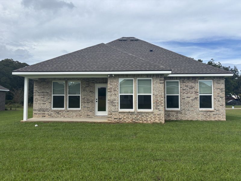 Exterior details and patio area of a home in Houston Place, Crestview (Image 3).