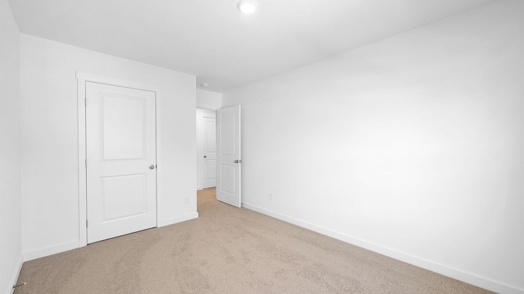 Spacious, unfurnished interior of a new home in Evergreen Landing, Rossville (Image 22).