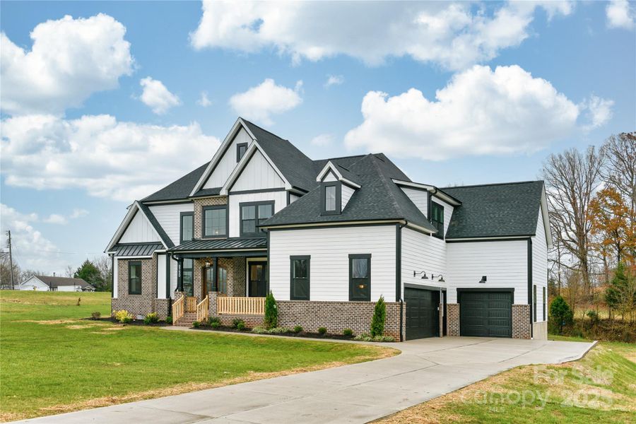 Front exterior of a new home in , Statesville, NC, highlighting curb appeal (Image 20).