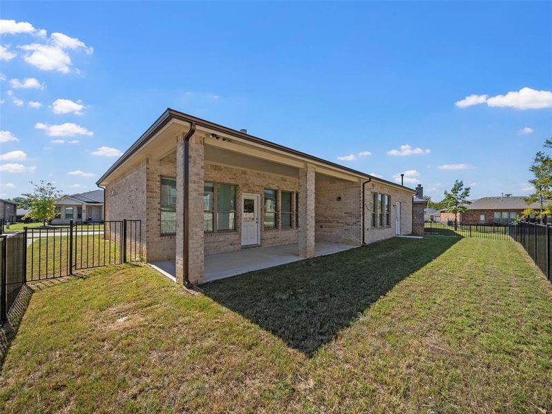 Exterior details and patio area of a home in , McKinney (Image 17).
