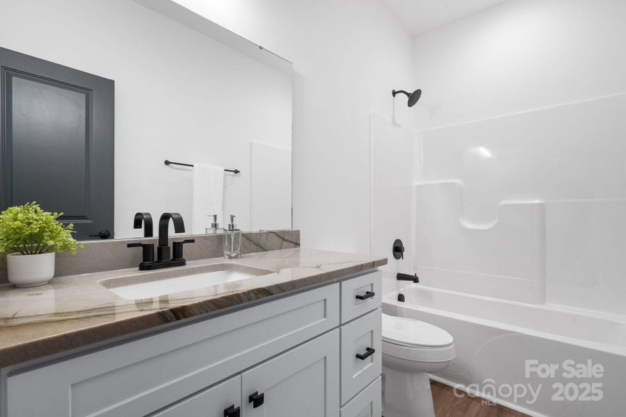 Furnished interior view inside a new home in , Hickory (Image 12).