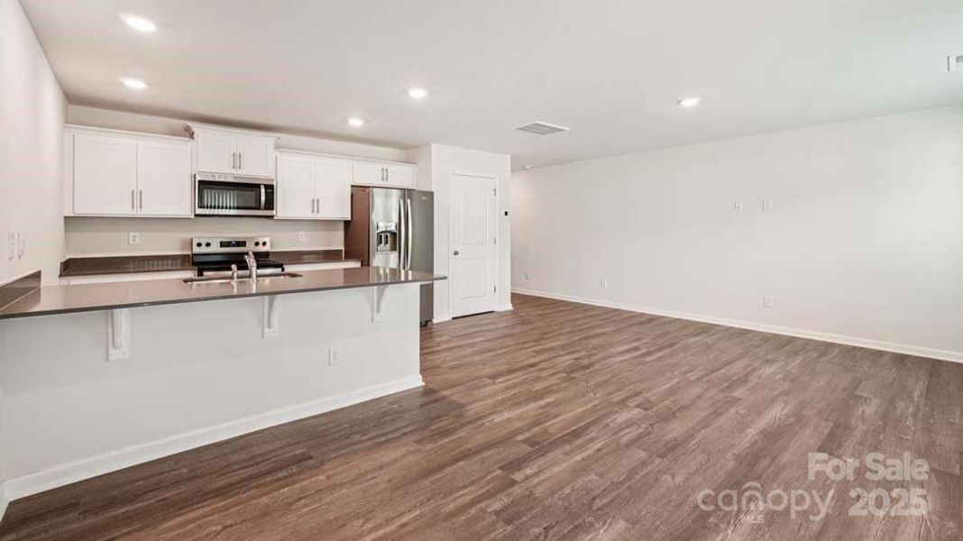 Spacious, unfurnished interior of a new home in Mallard Creek Townhomes, Charlotte (Image 14). Spacious, unfurnished interior of a new home in Mallard Creek Townhomes, Charlotte (Image 14).
