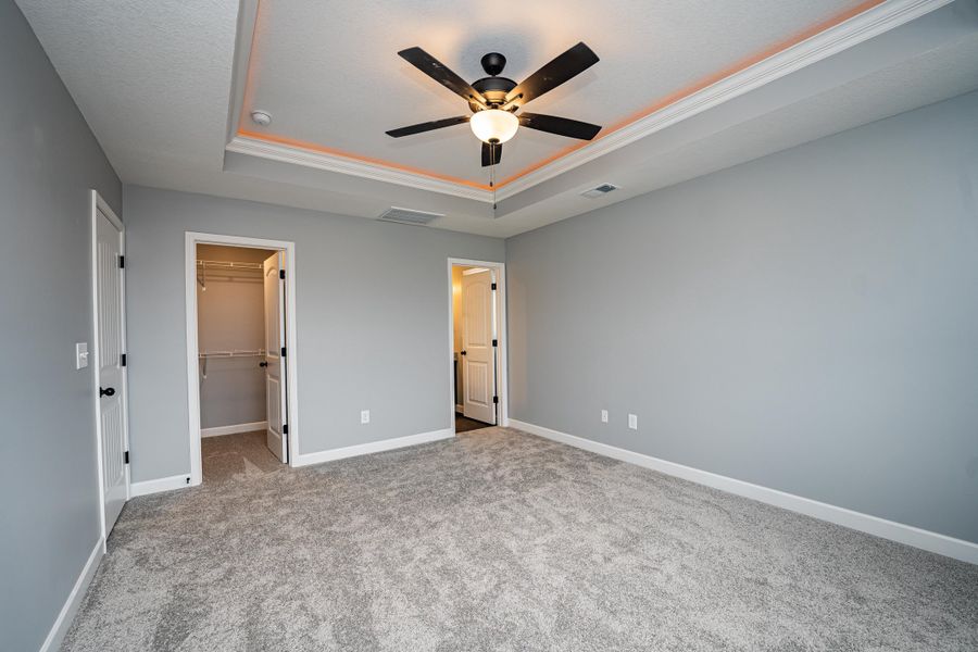 Representative unfurnished interior of a home built from the Saxon by Enchanted Homes in Guadalupe Heights, Seguin (Image 37).