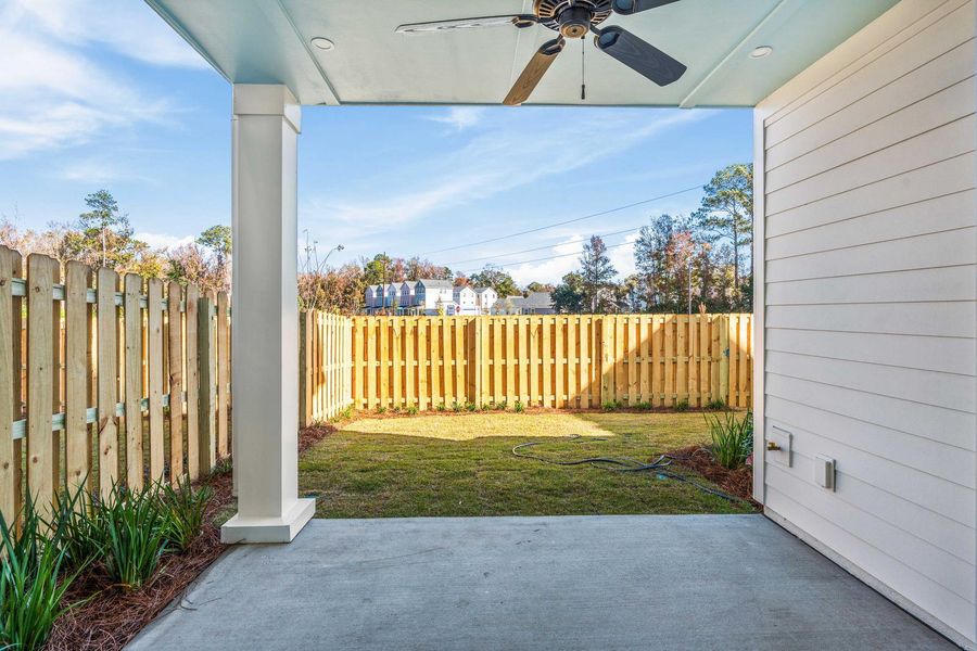 Exterior details and patio area of a home in , Johns Island (Image 30).
