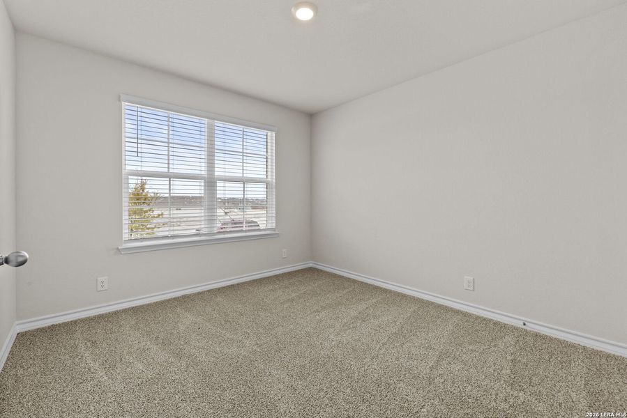 Spacious, unfurnished interior of a new home in Redbird Ranch, San Antonio (Image 13).