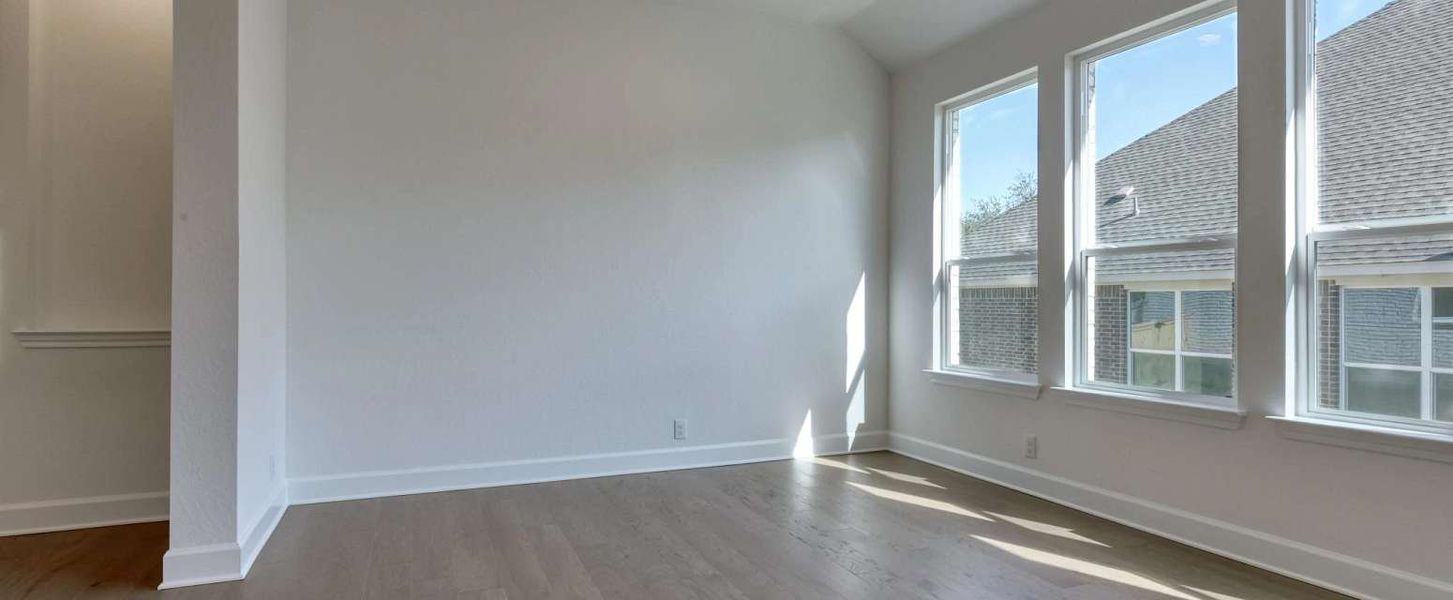 Representative unfurnished interior of a home built from the Alexander II by Ashton Woods in Sunday Creek at Kinder Ranch, San Antonio (Image 21).