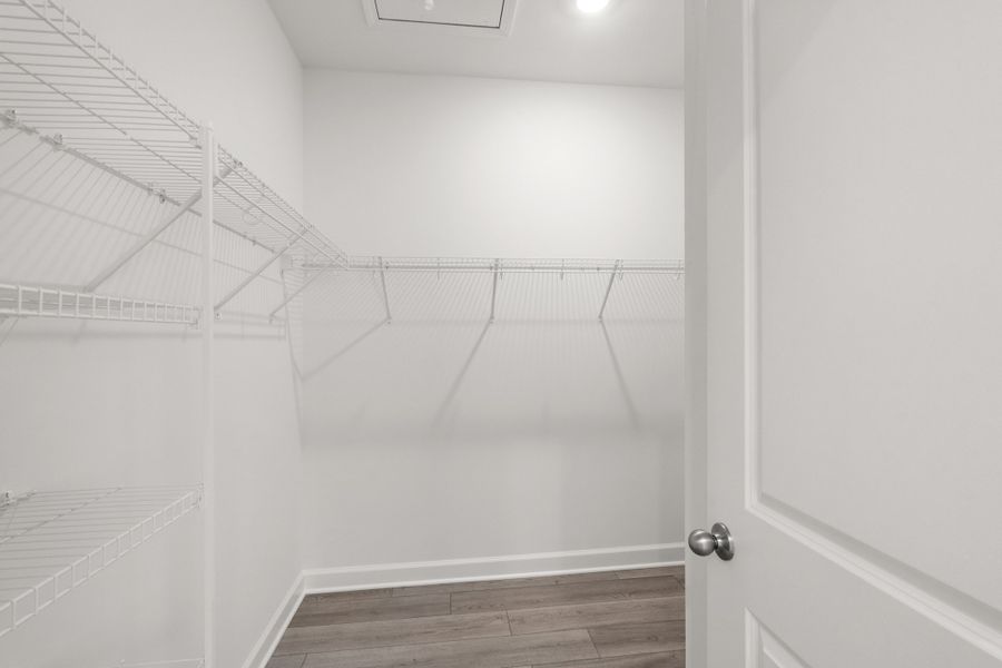 Spacious, unfurnished interior of a new home in Cypress Ridge - The Boardwalk Series, Longs (Image 16).