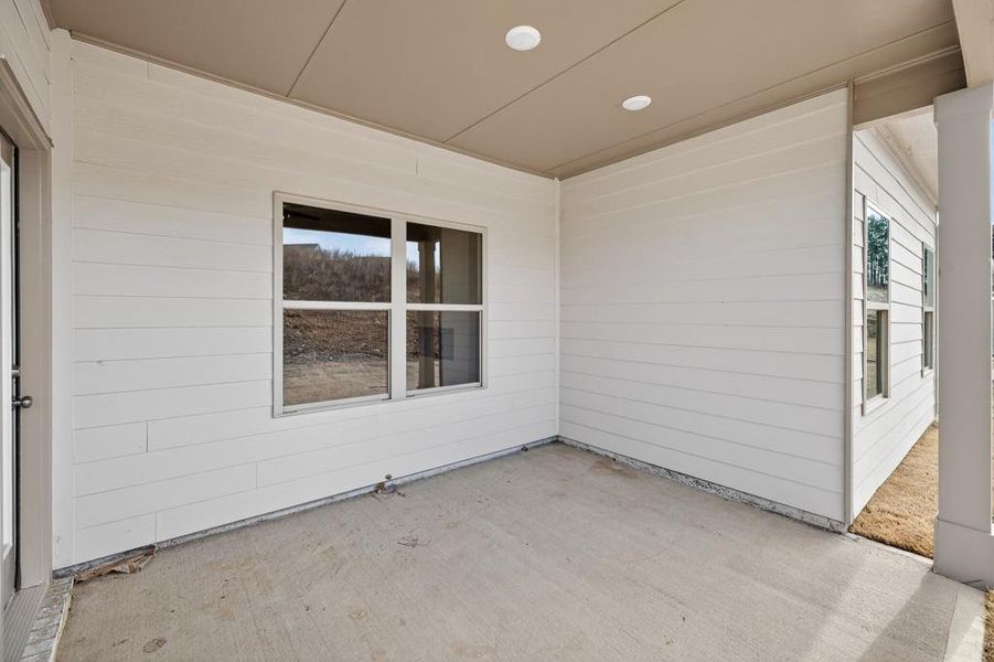 Exterior details and patio area of a home in , Homer (Image 21). Exterior details and patio area of a home in , Homer (Image 21).