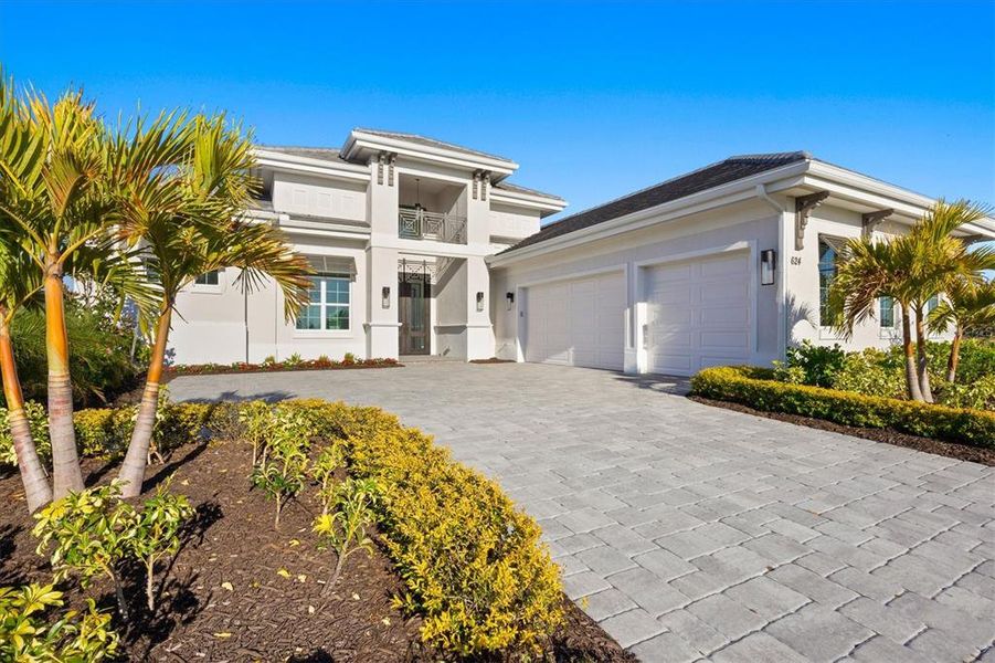 Front exterior of a new home in , Sarasota, FL, highlighting curb appeal (Image 20). Front exterior of a new home in , Sarasota, FL, highlighting curb appeal (Image 20).
