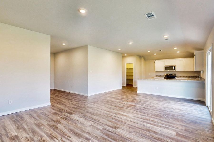 A large empty kitchen. A large empty kitchen.